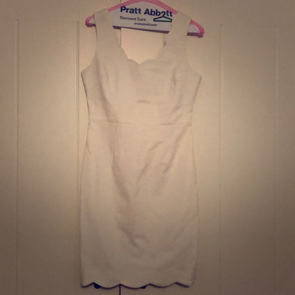 Scalloped white dress perfect for bridal shower